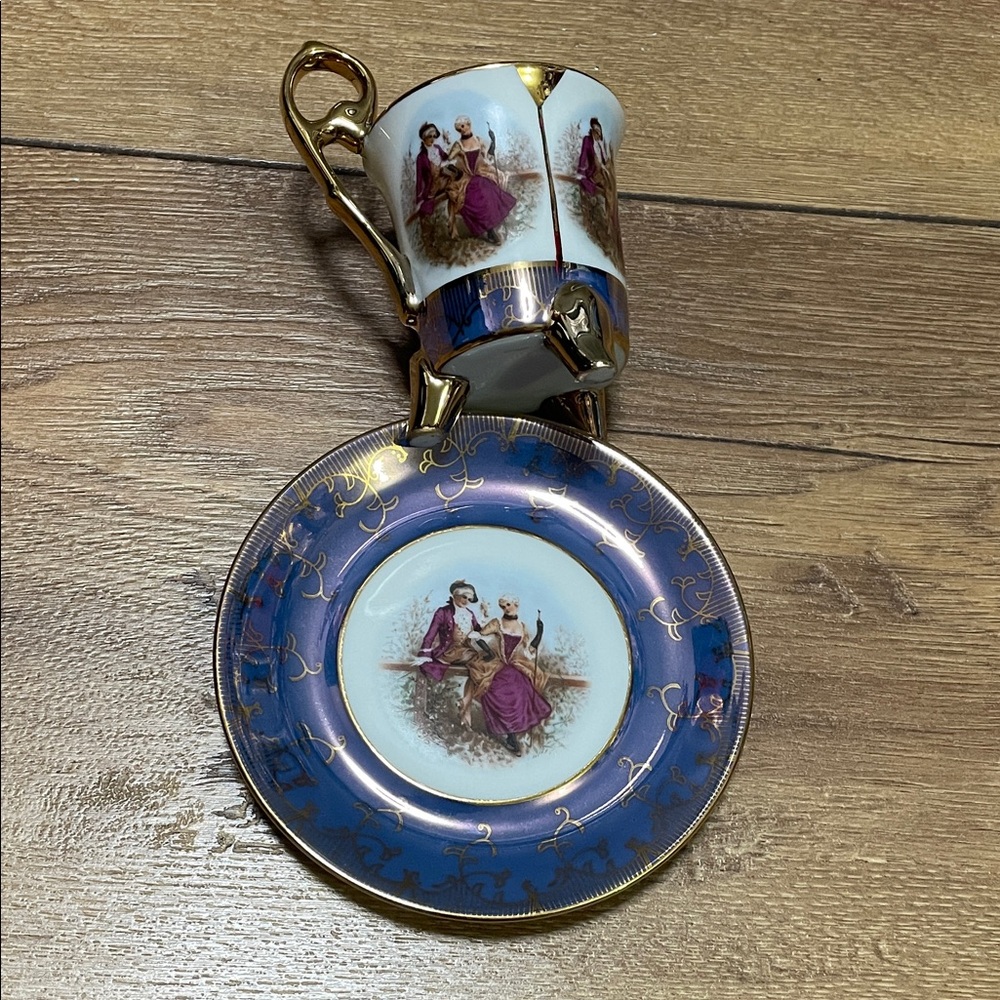 Elegant Blue and Gold Porcelain Cup and Saucer Set